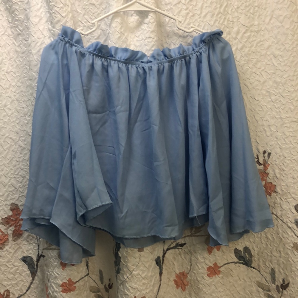 Off the shoulder light blue shirt